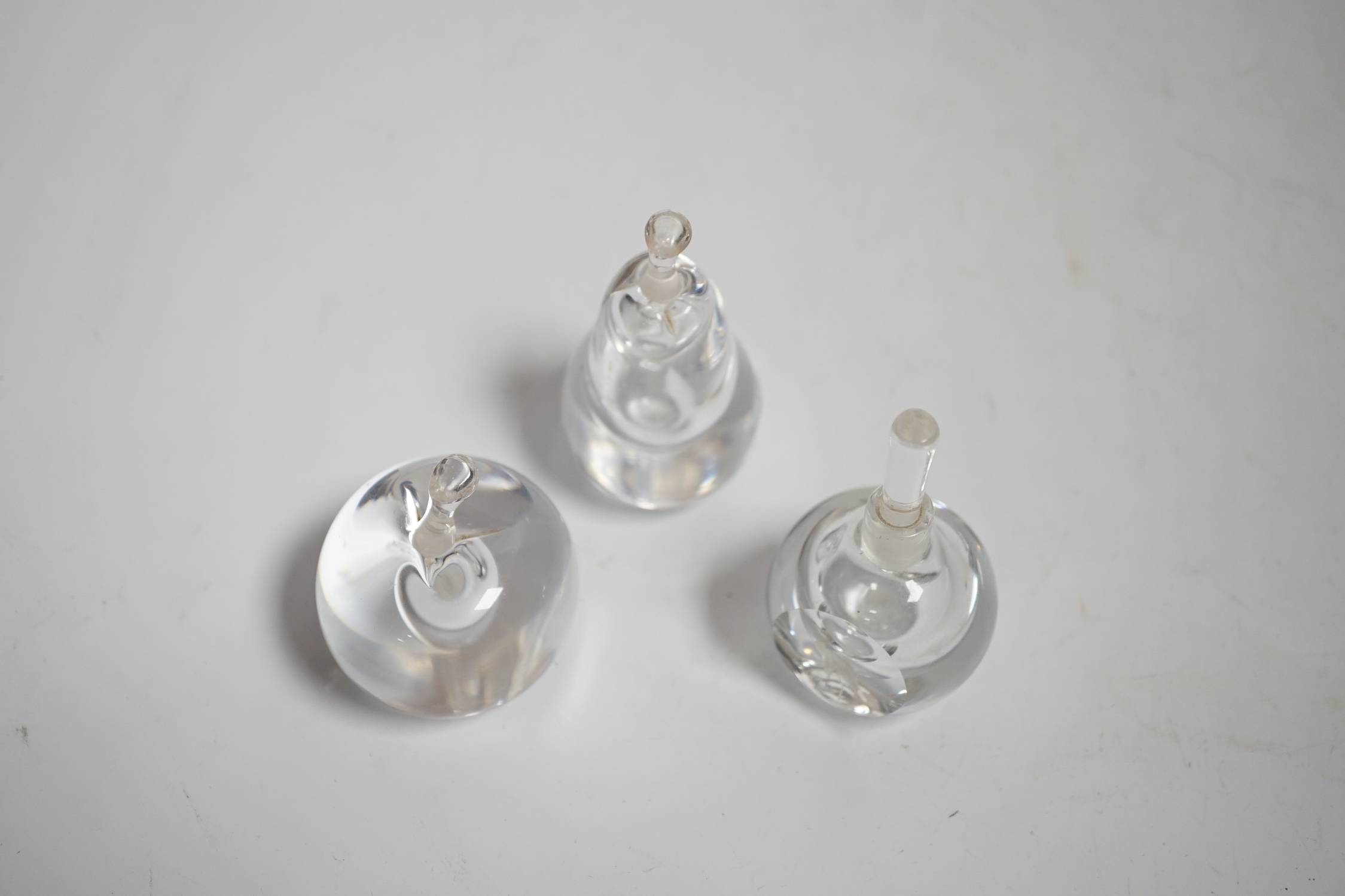 Three Vicke Lindstrand for Kosta Boda glass perfume bottles, tallest 7.5cm
